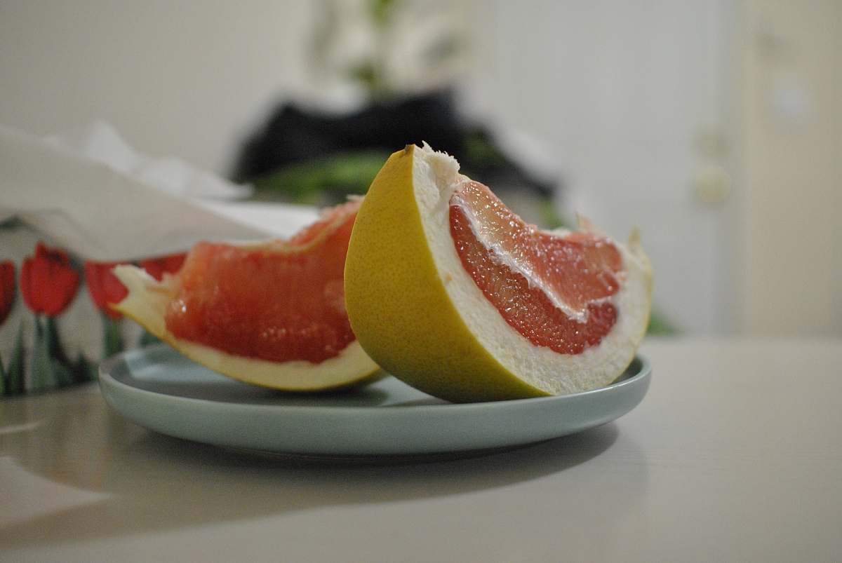 citrus fruit sliced ponkan fruits on plate grapefruit